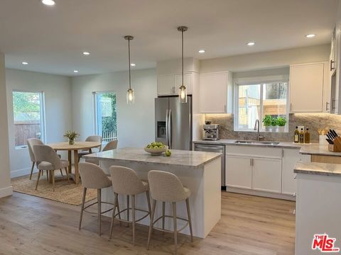 Photo of 1546 S Ogden Drive #A1, Los Angeles, CA 90019 (MLS # 26846483)