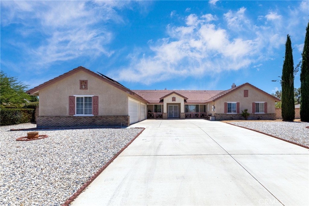 Built in 1994, this spacious & solar powered 3,024 sqft home is nestled in the heart of beautiful town of Apple Valley, California. It offers 5 spacious bedrooms plus an office, and 3 full and 1/2 bathrooms, thoughtfully designed to blend comfort and functionality. The open-concept living space features a cozy fireplace, creating a warm and inviting atmosphere for gatherings and relaxation. You'll love the kitchen with granite countertops, abundant cabinetry, kitchen island, and breakfast nook making it a delightful space for culinary adventures. The primary bedroom is huge! It has double doors, master retreat with fire place & built-in cabinetry, walk-in closet, and huge bathroom with separate jet spa tub & shower and double sinks. The office, which can turn to a guest room, also has built-in cabinets and shelves. Set on an expansive almost half an acre lot in a cul-de-sac, the property provides ample space for outdoor activities, gardening, or future expansions. Did I mention this home has pool & spa? Yes and it's ready to entertain your guests during the warm weather. The attached FOUR-car garage and spacious driveway ensure plenty of room for vehicles, RVs, or all your desert toys. Central air conditioning (2 of them!) and heating ensure year-round comfort for you and your loved ones. It has a laundry room with sink for your convenience. Enjoy the peaceful cul-de-sac neighborhood with picturesque mountain and desert view. Located near St Mary's Medical Center, shops, restaurants, and schools. So don't miss the chance to make this exceptional house your new home. Contact us today to schedule a private viewing or let your real estate agent know about it. See you soon!