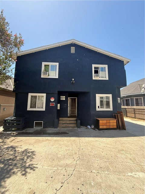 Photo of 822 W 60th ST, Los Angeles, CA 90044 (MLS # RS26157144)