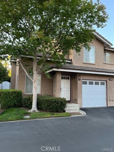 **HIGHLY DESIRABLE END UNIT** Townhouse-style end unit settled in the heart of Rancho Cucamonga. 3 bedrooms and 2 bathrooms upstairs, Powder room downstairs, fireplace in family room, dining room/living room combo with window seat, vaulted ceilings. Comfortable living in the heart of Rancho Cucamonga, a short distance from Victoria Gardens, Quakes Stadium, Ontario Mills Mall, Ralph's, 99 Ranch Market, parks and more. This Well-kept turnkey Willow Park complex with an excellent location and a private cozy backyard deserves you to name it HOME! Private 1 parking space garage with direct access and assigned one parking space close to front door. HOA comes with a pool, spa access and community maintenance. short distance to schools, shopping, Central Park and public transportation.