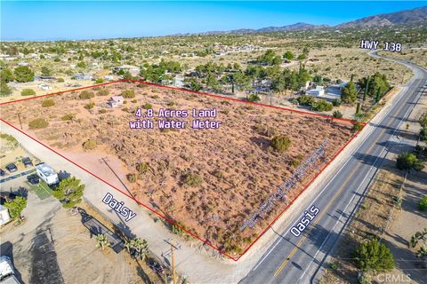 Photo of 0 Oasis, Pinon Hills, CA 92372 (MLS # HD26112381)
