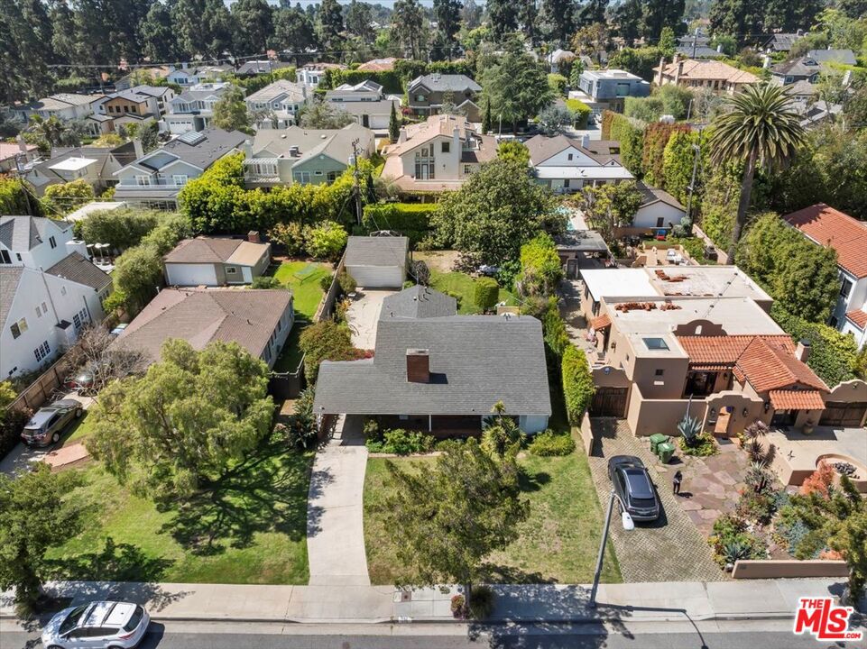 Endless possibilities to build your dream home or an exceptional opportunity for a luxury developer/investor. The home is sited on an expansive lot with a detached 2 car garage and no alley in back. Ideally located just North of Montana Avenue's shops and restaurants, and blocks from celebrated Santa Monica Schools and the iconic Brentwood Country Mart. Please do not disturb occupants. Property will be delivered vacant.