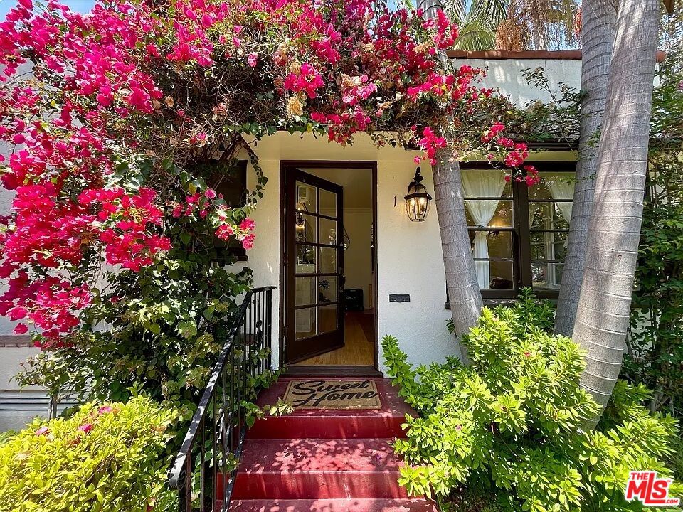 Quintessential Southern California living This is the front bungalow in a 1920s Spanish style bungalow court Unit has a huge private, fenced off, grassy front yard that wraps around the bungalowIn addition to the yard, unit also has a back patio accessible through the kitchen No one above or below and only one common wall Beautiful landscaping LOTS of natural light Only a few steps to the front door Oasis of bougainvilleas, roses, & palm trees Laundry in unit Split system A/C located in living room Brand new white granite countertops Hardwood floors throughout & tumbled marble bathroom Stainless steel appliances Pet friendly Street parking (permit only)Walking distance to all the shops, cafes, & restaurants on Montana Ave Water/sewer/trash included. Tenant responsible for gas & electric. Pet friendly. 1 yr lease.