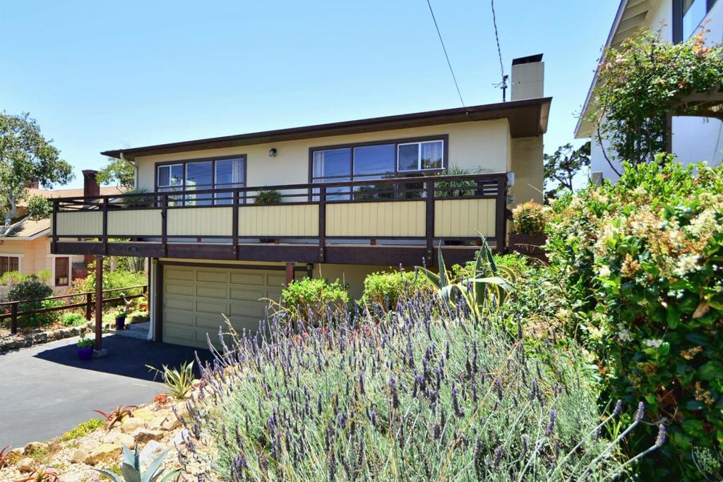 Located in Monterey's Historic district, this updated 3 bdrm 2 bath, single level home is just a short stroll to downtown shops & restaurants, Fisherman's Wharf & beach. Big bay views, beautiful Travertine floors, custom built-ins, newer comp roof & decking, double pane windows, inside laundry & a bonus room-ideal for home office/exercise room. The private fenced back yard is like it's own little zen oasis, professionally landscaped with low maintenance, drought tolerant plants & gazebo.
