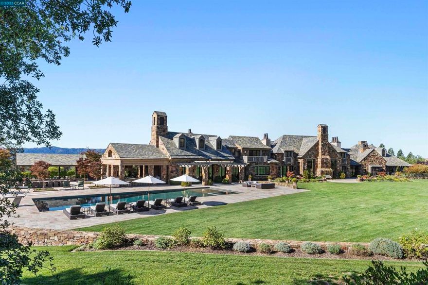Fieldhaven Estate, a monumental investment of over $135 million completed in 2012, beautifully positioned on over 21 stunning acres in Alamo. Located just 30 miles outside of San Francisco, the property features 10 bedrooms, 22 bathrooms, a detached two-bedroom guesthouse living room and a custom car barn that accommodates 20+ cars, with a guest house above. Crafted over 3.5 years by a global team, the estate seamlessly blends old-world charm, craftsmanship, and modern amenities. Outdoor highlights include an oversized pool, stone grotto kitchen/barbecue area, and a solar field powering the entire property. Designed for large-scale entertaining and intimate living, Fieldhaven Estate is an unmatched legacy property. Beautifully manicured with lush lawns, mature oaks, and stone walls, this is a rare opportunity to own one of the Bay Area's most exclusive estates.