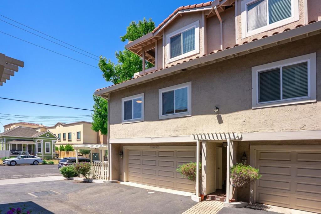 Beautiful Craftsman & Tuscany style Town Home in perfect Santa Clara Location! Completely remodeled in 2005 with recent (2025) updates including new LVP flooring, fresh interior paint and refinished cabinets and vanities. Great floor plan with 2 bedrooms and 2 Full bathrooms. Primary bedroom with Private Balcony. Granite slab countertops, Beautiful Custom cabinetry with Pantry. Top of the line Stainless Steel appliances. Electric cook top, Microwave, Refrigerator, Multi-cycle dishwasher. Washer & Dryer in garage. Custom wood-burning fireplace with pre cast mantle. Nearly 1000 sq ft of comfortable living space. Central heat. Two Car Garage with automatic remote opener and lots of storage space. End unit with private patio off of garage. Close to Santa Clara University. Nearby shopping, coffee shops, and restaurants. Great commuter location with easy access to freeways, Caltrain & SJ Airport. Much more...