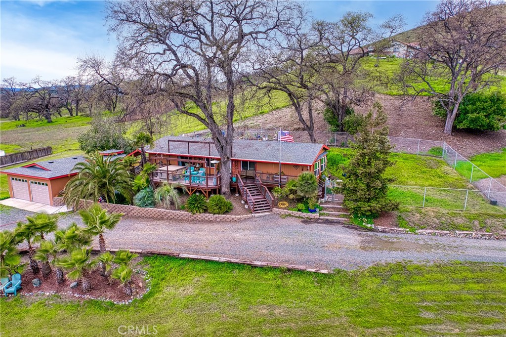 This stunning lakeview home presents 1451 square feet of refined living space designed for comfort and style, nestled on an impressive 2.4 acre parcel that may be splitable. The well-designed layout includes a total of 3 bedrooms and 2 full bathrooms outfitted with modern bath and shower facilities.
It showcases an open floor plan with functional kitchen equipped with a stove/oven/refrigerator, seamlessly flowing into a cozy dining and living area, perfect for entertaining or relaxing. Conveniently, it also hosts a functional laundry room (washer and dryer included). Bonus is an expansive terrace with hot tub to enjoy sweeping views of Clear Lake and Mount Konocti.
In addition, there is new 2-car garage AND a 960 sqft 3 car garage or workshop perfect for overflow storage, side-business, or hobbies. Fenced garden area ready for your green thumb.
Each element of this property has been thoughtfully designed to construct an ideal blend of functionality and style, truly making it a unique find.