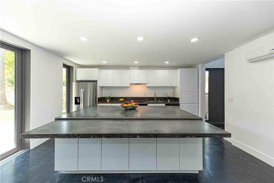 Welcome to 7503 Linley Lane, a stunning contemporary designed home built in 2022. This 2-bedroom, 2.5-bathroom residence offers modern living with an open-concept layout and high-end finishes. The gourmet kitchen features stainless steel appliances, abundant cabinets and drawers, and a large island. Upstairs, you'll find two spacious bedrooms, each with its own bathroom and access to a gorgeous balcony overlooking lush greenery. The home also boasts a gorgeous, private, and green backyard perfect for outdoor entertaining. Located in a quiet, family-friendly neighborhood, this home is close to top-rated schools, parks, shopping, and dining. Don't miss this opportunity!