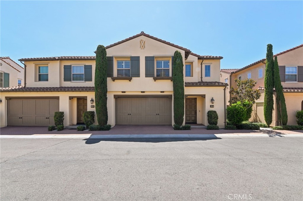 Nestled in the highly sought-after community of Stonegate Village, this beautifully appointed 3 bedroom, 2.5 bath condo offers the perfect balance of comfort, style, and convenience. With 1,777 square feet of thoughtfully designed living space, this attached home is ideal for modern living in one of Irvine’s most desirable neighborhoods. Step inside to discover a bright and open floor plan that seamlessly blends the living, dining, and kitchen areas. The gourmet kitchen boasts sleek corian countertops, a spacious center island, and stainless steel appliances—perfect for both everyday cooking and entertaining. Large windows fill the home with natural light, while upgraded finishes create a warm and inviting atmosphere. Upstairs, you’ll find three spacious bedrooms, including a luxurious primary suite with a walk-in closet and spa-inspired bathroom featuring dual vanities and a walk-in shower. The additional bedrooms are generously sized and share a well-appointed bathroom. A convenient upstairs laundry room and ample storage throughout the home add everyday ease. The 2-car attached garage with direct access provides both security and convenience. As part of the Stonegate community, residents enjoy resort-style amenities including multiple swimming pools, parks, playgrounds, sports courts, and scenic walking trails. The neighborhood is part of the award-winning Irvine Unified School District, with top-rated schools such as Stonegate Elementary, Jeffrey Trail Middle School, and Northwood High School, all just minutes away. Perfectly located near Woodbury Town Center, Irvine Spectrum, and major freeways (I-5, 133, and 241), this home offers unparalleled access to shopping, dining, and entertainment, while maintaining a quiet, family-friendly atmosphere. 167 Overbrook offers not just a home, but a lifestyle — where modern living meets community charm in the heart of Irvine.