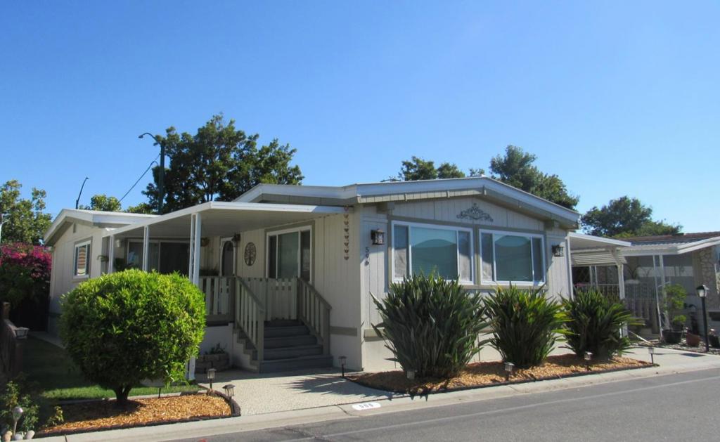 UPGRADES GALORE! In this spacious, freshly painted triple-wide, youll find luxury features such as upgraded wood siding/skirting, crown molding, ceiling fans, recessed lighting, central heat and A/C, & dual-pane windows for lots of natural light. Laminate flooring in the kitchen, laundry room, and bathrooms, and brand new soft beige carpeting throughout the rest of the home. One small room can be used for an office/den or a third bedroom. The updated kitchen features a breakfast bar, granite countertops, lots of cabinets with lighting, tile backsplash. It comes with all appliances, including a new fridge. Main bedroom offers a built-in dresser, mirrored closet doors, a private bath with dual vanities, granite counters, a soaking tub and a sizable walk-in shower. The Laundry room has a sink, a new washer/dryer, and extra storage. Enjoy quiet evenings or a morning cup of coffee on the spacious front porch. The backyard is a homeowner's dream to entertain, relax, or garden and a fenced-in yard for your special pet(s). 1975 Baron Vilsa S/N834X/U/XX