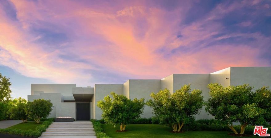 Madison Club. Exquisite warm contemporary setting the bar in design, build, finishes and style. Approx. 15,700 SF under roof with more than 14,100 under AC including a world class car display showroom for 10 cars. Comfortable staircase and an elevator to second floor where it's all master, boasting approx. 3,700 SF under roof (approx. 2,700 SF under AC) and featuring an enormous covered balcony with multiple areas and fireplace, infrared sauna, gym area, kitchenette, resort-style double closets and baths with an additional fireplace, heated floors and a steam room all with explosive views of the golf course and glorious mountains on both sides. On the first floor additional 6 beds to a total of 7 beds including a separate casita with its own parking spots and entry. Dedicated Chef's Kitchen opens to an outdoor kitchen & modern farm table style perfect for a dinner for 12 outside. Lake like Zero edge pool sits on the infinite rolling lawn merging into the golf fairway. 17 TVs, state of the art lighting design, sound and home automation, 16 AC zones, 7 fireplaces and 2 fire pits, wine room, large storage room, 3-phase 800 amp main panel, solar system, pool bath and shower, cutting edge water feature and entry pool, Italian cabinetry throughout, Fleetwood custom color pocket doors & automation. Fully furnished and including 18 major art pieces that were masterfully selected. Massive gates & mature and magnificent landscape on all sides create unique atmospheric privacy.