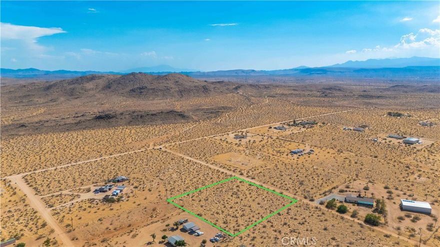 This 2-acre lot in Landers provides an ideal setting for your dream home or desert retreat. With utilities conveniently located in the street, building is made easy. Enjoy breathtaking views of Goat Mountain, offering a stunning natural backdrop. This property combines convenience, beauty, and tranquility in a serene desert environment.