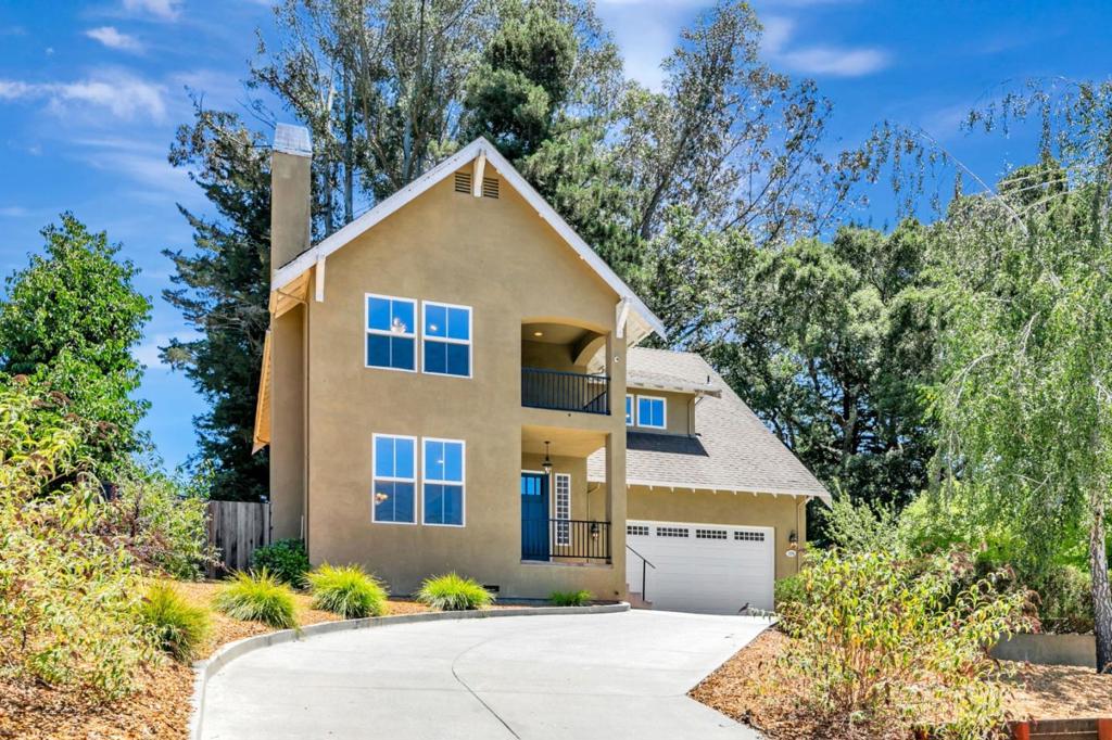 Smart and stylish, this large 4-bedroom, 3 bath home sits on the edge of Silicon Valley and the Santa Cruz coast with an easy commute to both. It sits on a fully usable 1/4-acre lot with warm sunshine in front and cooling shade in the back. The chef's kitchen boasts a subzero refrigerator, Wolf range with griddle, Bosche dishwasher, double convection oven, cherry cabinets, granite slab counters and a large island. It features eight-foot ceilings, solid wood doors, circulating hot water, separate heating zones on both floors as well as a gas fireplace capable of keeping the living room warm all by itself. Glass block, cherry cabinets, and satin nickel fixtures tie all the bathrooms together and the living/dining room features beautiful hardwood floors. The primary bedroom suite has high ceilings, an elegant marble bathroom, walk-in closet and its own private deck with sunsets all year around. The roomy loft/office/family room is an amazing space for homework, video games or watching TV. The large windows in the family room offer a great view of the huge back yard. Combine all this with the fact that it's situated in the much sought-after Scotts Valley School District and it's everything you've wanted in your next house. Just go take a look!