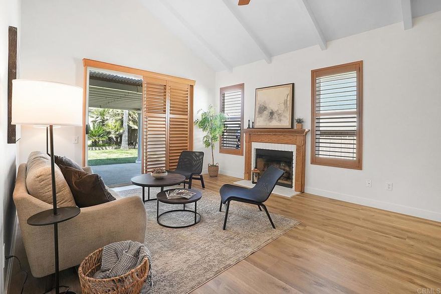 Welcome to this beautifully maintained 2-story home in a secure gated community! Featuring 3 bedrooms, 2 bathrooms, and a spacious open-concept layout, this move-in-ready home offers both comfort and style. Enjoy high ceilings, a bright and airy feel, a 2-car garage, and paid-off solar panels, saving you money from day one. Conveniently located near shopping, dining, and major freeways, this home checks all the boxes!