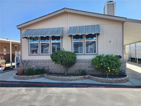 Photo of 9850 Garfield Ave, Huntington Beach, CA 92646 (MLS # OC26140824)