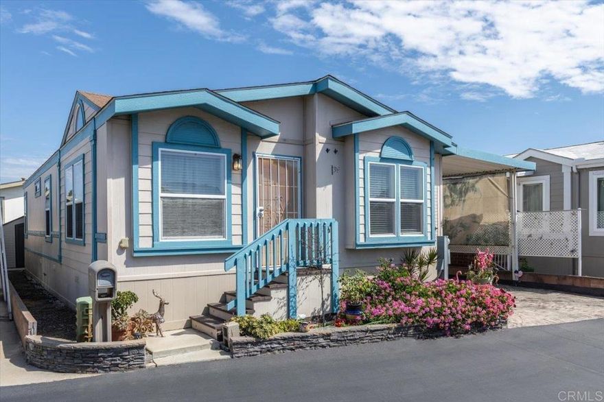 Own your own land & Home!  Gated, “resident owned community” located only about 5 miles from the coast!  Ride your bike along the nearby San Luis Rey River trail to the Oceanside Harbor & Beach!  Active & Social 55+ community w/ low HOA fees of only $175 / month includes Water, Trash, & Sewer!  No space rent!  This 2 bedroom / 2 bathroom “post HUD” home does have a recorded 433A.  Open floor plan with drywall and vaulted ceilings and lots of natural light produced by multiple solar tubes and high window dormer.  Separate Laundry room with extra storage cabinets.  The Primary Bedroom has a retreat, 2 closets, an ensuite Bathroom with a step in shower and double sinks, and it's private entrance with a sitting deck.  All appliances are included, plus the Washer and Dryer, and the dishwasher and microwave are newer.  This is an active community with lots of activities for seniors to meet and socialize with new friends.  Community features include clubhouse with library, fitness room, shuffle ball court, banquet/card room, basketball hoop, hobby room, additional laundry facility, billiards room, kitchen, car wash, RV/boat parking (subject to availability) and more!  Conveniently located close to shopping choices (Ralphs, Stater Bros., Albertsons & Vons), restaurants, grocery, medical offices (Scripps Coast Medical Office, Kaiser, & VA clinic), walking distance to historic San Luis Rey Mission, nearby bike trails and approximately 5 miles from the beautiful Oceanside coast and harbor!  Financing options are available, just ask Listing Agent if you need contacts.  Come check it out and see if this home is just what you've been searching for!  This is a NO pet park, only service animals are allowed.  One resident must be age 55+, the second can be age 50+.