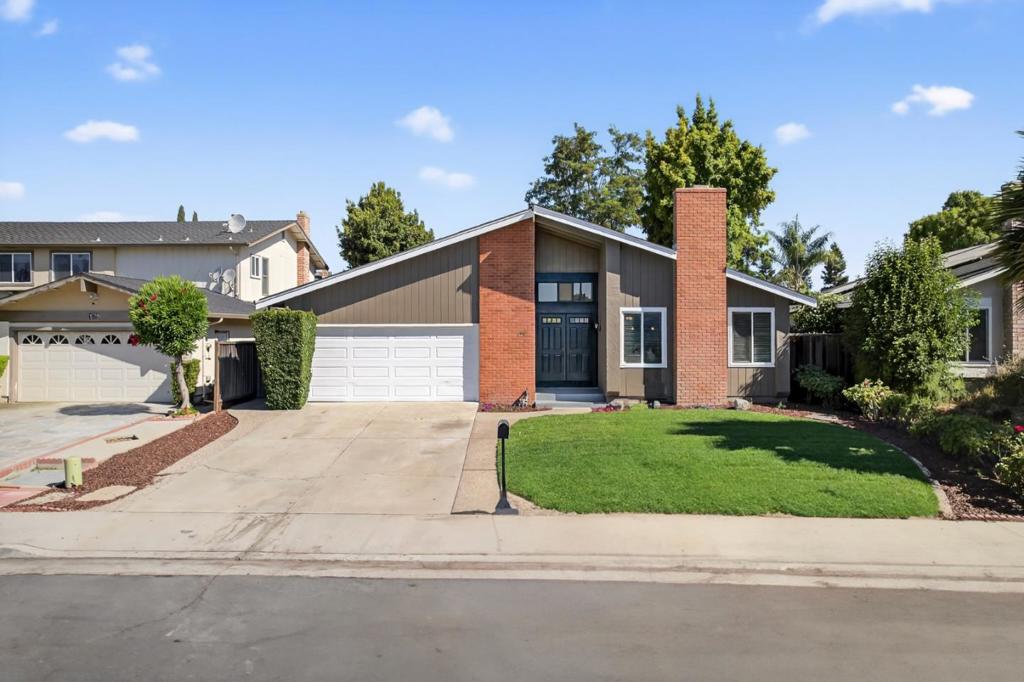 Welcome to 125 Juneberry Ct - a beautifully maintained 5-bedroom, 2-bath home tucked away in a peaceful San Jose cul-de-sac. This thoughtfully upgraded property offers the perfect combination of space, style, and comfort for today's modern lifestyle. Step inside to soaring vaulted ceilings and an open concept living space filled with natural light. The living room features recessed lighting and a cozy fireplace, flowing effortlessly into the dining area and gourmet kitchen. The chef's kitchen is equipped with granite countertops, rich wood cabinetry, and pendant lighting over a large peninsula - perfect for entertaining or casual dining. With five spacious bedrooms, this home provides flexibility for families, home offices, or guest accommodations. Both bathrooms are updated with elegant finishes, including stone tile, granite countertops, and a luxurious walk-in shower. Step outside into your private backyard oasis - an ideal space for hosting summer barbecues, enjoying your morning coffee, or letting kids and pets play freely. The beautifully landscaped yard is framed by a tall fence for privacy and includes a generous patio area perfect for outdoor living. Come take a look before it's too late!
