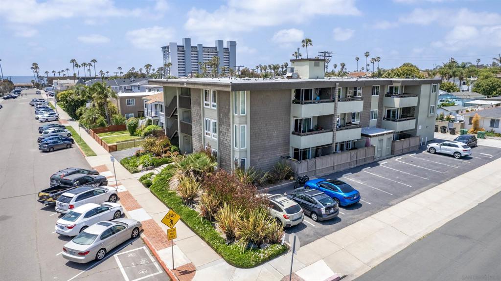 Pleased to offer for sale, for the first time ever since its construction, 870 Diamond Street, a 22 unit apartment property located just 2 blocks from the beach in desirable Pacific Beach, within its coveted northwest quadrant. Attractive Seller Financing is offered with this sale. Built in 1972, held and meticulously maintained by the same family as its original architect and developer (Henry F. Bugenhagen) for over fifty years since, this is a very rare opportunity. The unit mix consists of: 13 x 1Br/1Ba units; 3 x 1Br/1.5Ba units; and 6 x 2Br/2Ba units, each with its own generously sized private patio or balcony, some with peek ocean views. There are twenty two (22) off-street parking spaces, six of which are covered. Many units have been updated with vinyl plank flooring in kitchens and bathrooms, newer cabinetry, quartz countertops, and newer white appliances (incl. dishwasher). The building is serviced by a central elevator, two stairwells, and there are multiple controlled access ground floor entry points. Each floor (3) has its own laundry room with owned equipment. Interior hallways have a fire monitoring system and fresh air duct system. Electricity for the building is separately metered, while gas is on a master meter that powers the central recirculating boiler and hot water tank. Building upgrades over the past 12 years include: 'low E' glass, dual-pane vinyl windows and sliders throughout (2024); newer stairway landings, concrete steps and railings; resurfaced stucco and exterior paint; full elevator upgrade with new elevator equipment; new central boiler (2024); newer exterior common area lights; and installation of perimeter drought tolerant landscaping. The property benefits from much higher density than what current zoning would allow to be permitted today, by virtue of its previously conforming use, prior to the immediate area being down-zoned in the 1980s. Currently zoned RM-1-1, only 4 dwelling units would be permittable by right at this site presently.