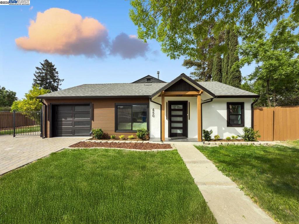Step into this beautifully renovated home, thoughtfully designed with a full, permitted renovation that blends timeless style with modern convenience. This 4 bed 2 bath home offers nearly 1,800 sq ft of refined living space and a flowing open floor plan ideal for both everyday comfort and stylish entertaining. Every detail has been carefully curated, starting with striking curb appeal, a brand-new roof, fresh exterior paint, and an inviting front porch with contemporary wood posts. Inside, the transformation continues with brand-new windows, recessed lighting, and luxurious new flooring throughout. The fresh interior paint, modern interior doors and sleek baseboards create a cohesive, elevated aesthetic. Enjoy new electrical systems(including main and sub-panels)newer plumbing and a brand-new HVAC system for year-round comfort.The redesigned kitchen is the heart of the home, now ideally situated for both function and flow! It features modern cabinetry, quartz countertops with a waterfall, tile backsplash, and stainless steel appliances. Also, outdoors, it features brand new pavers, landscaping, new side fence, a modern pergola which all reside on a huge corner lot. Location is amazing,near schools,freeways & shopping. You will fall in love with this unique, fully reimagined home!