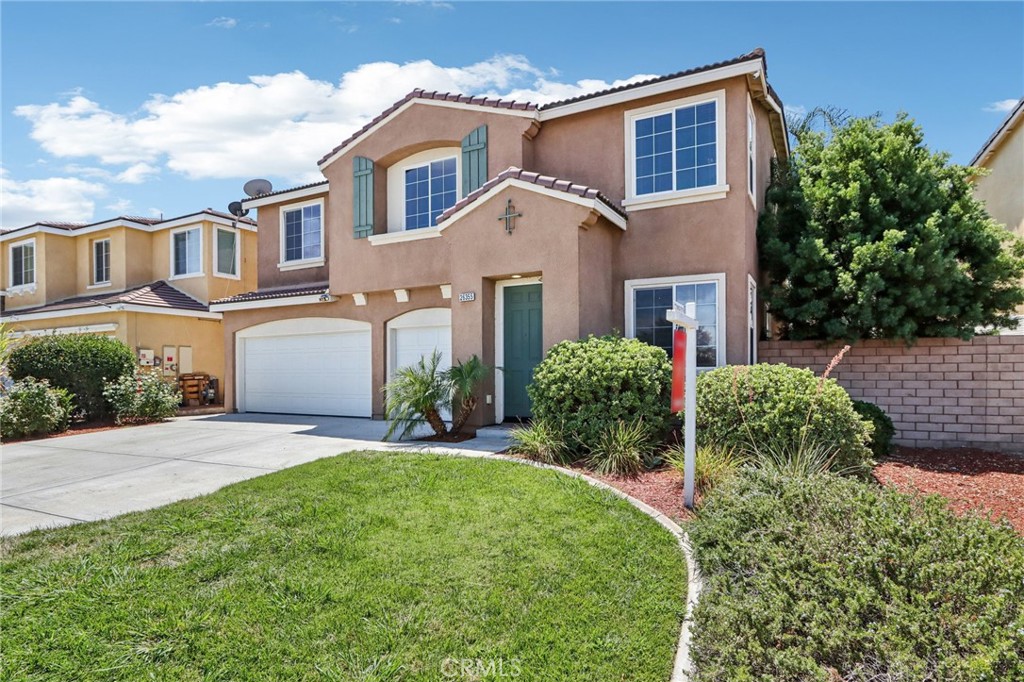 Spacious & Stylish 4-Bedroom Menifee Home with Loft, 3-Car Garage, and Gorgeous Backyard. Go into this beautifully upgraded 3,203 sq. ft. home, perfectly designed for comfort, style, and functionality. Situated on a 6,534 sq. ft. lot, this residence offers 4 bedrooms, 3 full baths, and a versatile bonus loft — ideal for a home office, playroom, or media space. The open-concept design features a bright, airy great room that flows seamlessly into the chef’s kitchen, complete with granite countertops, an oversized island with elegant pendant lighting, abundant cabinetry, and stainless steel appliances. A separate formal living room adds extra space for gatherings and special occasions. Upstairs, the primary suite feels like a private retreat, with dual sinks, a walk-in closet, and plenty of natural light. A downstairs bedroom with a full bath offers the perfect setup for guests or multigenerational living. Throughout the home, you’ll find luxury vinyl plank flooring, adding both durability and modern elegance. Go outside to a landscaped backyard oasis, featuring mature white rose bushes and palm trees — the perfect space for entertaining or relaxing. The 3-car garage provides ample storage and parking. This home also features assumable financed solar, offering a significantly lower monthly cost compared to most utility bills. Located in a highly desirable neighborhood, you’re just minutes from the Menifee Town Center, local parks, a brand-new elementary school, scenic walking trails, shopping, and quick freeway access. This home offers the perfect balance of luxury, convenience, and lifestyle — a rare find in today’s market.