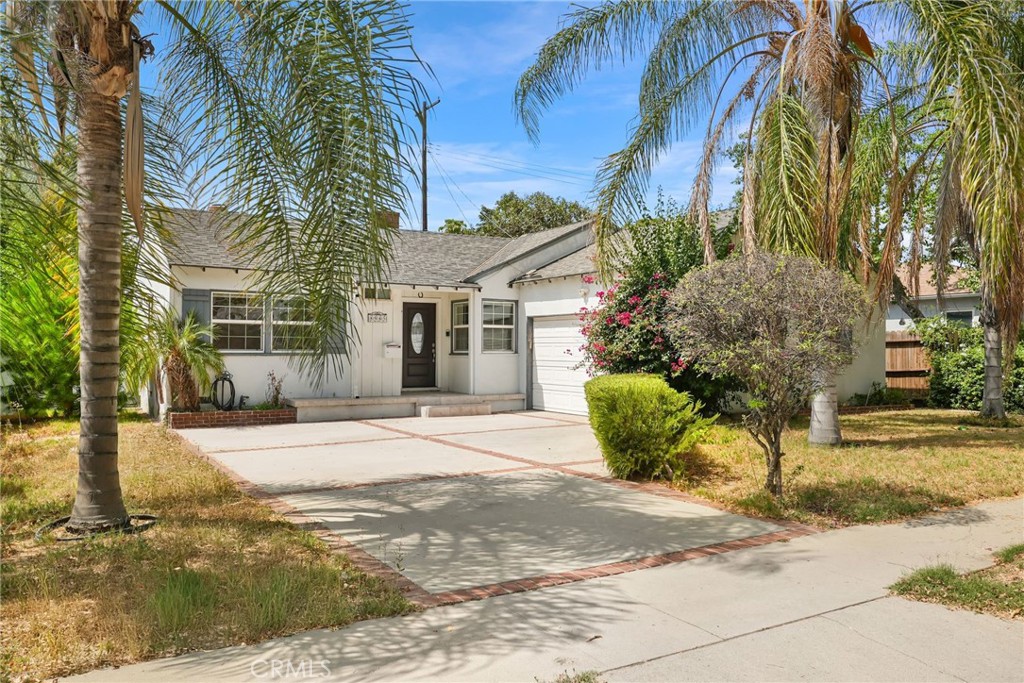 Charming Northridge single-family home close to everything! Featuring 3 bedrooms and 1.5 baths. Step inside to find a light-filled living space with wood flooring, newer windows, and central air/heat for year-round comfort. The updated kitchen boasts modern finishes and flows seamlessly into the living and dining areas, while the refreshed bathrooms add a stylish touch. The large backyard offers endless possibilities for outdoor living, entertaining, or even future expansion. A 2-car attached garage provides convenience and additional storage. With your personal landscaping touches, this property has all the ingredients to become an amazing home!