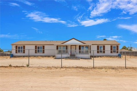 Photo of 9235 Lindero RD, Phelan, CA 92392 (MLS # HD26168619)