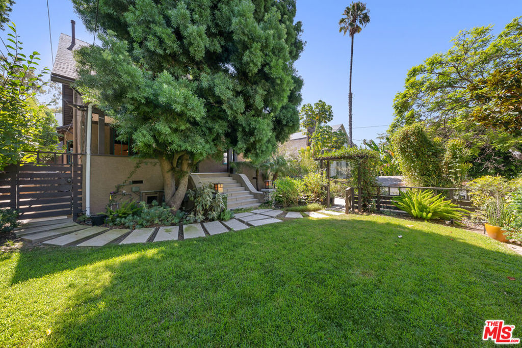 Welcome to a beautifully renovated 4-bedroom, 2-bath Craftsman set on a historic, tree-lined street in the heart of one of LA's most vibrant neighborhoods. The main residence (approx. 1,822 sq ft) has been lovingly updated while preserving its timeless character and traditional, charming layout. Beautiful hardwood floors throughout, open, light and bright. Enjoy captivating views from the second floor, and a gated front lawn that adds privacy and enhances the home's curb appeal.Live moments from the iconic Silver Lake Reservoir, acclaimed restaurants, boutique shopping along Sunset Junction, the historic Vista Theatre, and countless coffee shops at your fingertips. With easy access to Sunset Boulevard and the 101, you're perfectly positioned to enjoy everything LA has to offer.A rare opportunity to enjoy a piece of Silver Lake history classic craftsmanship paired with everyday convenience in an unbeatable location