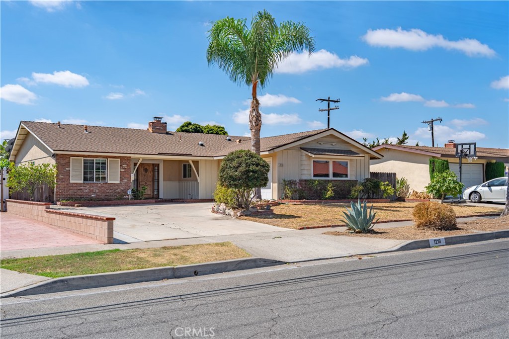 Welcome to this beautifully remodeled home, tucked away in one of Fullerton’s most sought-after neighborhoods. Combining modern updates with timeless character, this residence makes a lasting impression the moment you arrive at the custom entry door. The open, well-designed floor plan flows effortlessly, ideal for everyday living and entertaining alike. A enclosed patio extends the living area, while fresh interior paint and new bedroom flooring create a crisp, move-in-ready atmosphere. Rich hardwood floors in the main spaces and recessed lighting throughout add warmth and sophistication. The chef’s kitchen is a true centerpiece, showcasing granite countertops, a stacked stone backsplash, designer cabinetry, and solar tube lighting. The spacious primary suite is filled with natural light and offers a generous walk-in closet. Its spa-inspired end-suite bathroom features dual vanities, granite counters, and sleek finishes for a touch of everyday luxury. Additional highlights include dual-pane windows and sliding doors for energy efficiency and year-round comfort. Whether you’re enjoying the tranquil sunroom, hosting gatherings in the backyard, or unwinding in your private retreat, this home offers the perfect blend of comfort and style.
Conveniently located minutes from Brea Mall, Cal State Fullerton, parks, restaurants, and entertainment, the home also provides quick access to major freeways—making commuting simple without sacrificing neighborhood charm.
Don’t just purchase a home—embrace a lifestyle. Welcome to 1218 Evergreen Avenue, Fullerton