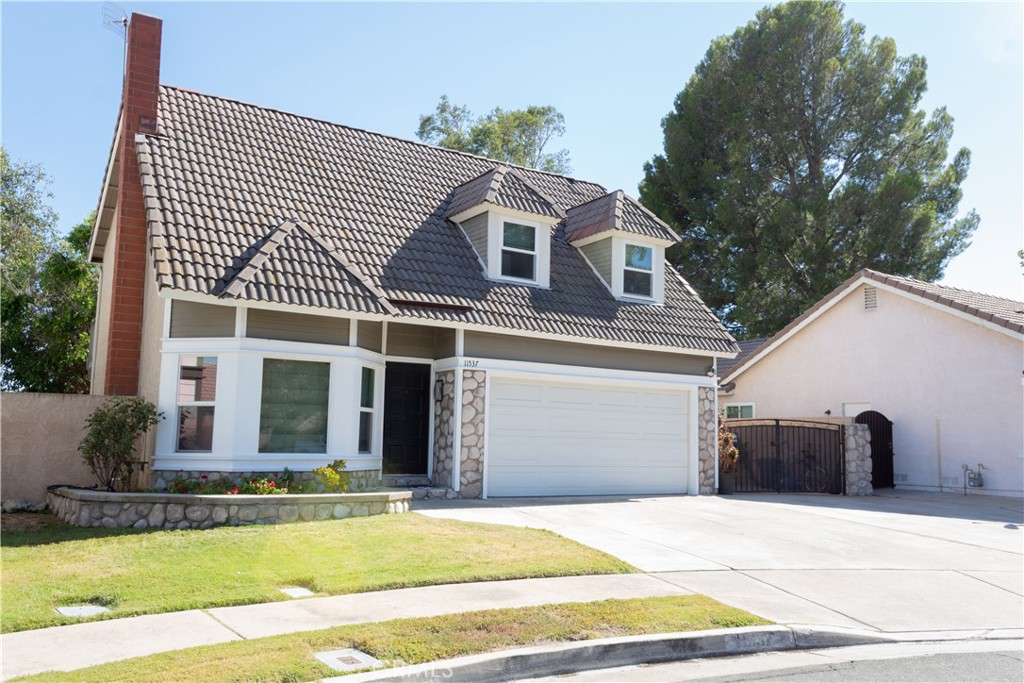 Welcome to 11537 Mount Hood Ct, a beautifully updated 3-bedroom, 2.5-bath home with a versatile loft in the highly sought-after community of Rancho Cucamonga in the Vintage Highland neighborhood! Boasting 1,472 sq ft of living space on a 4,800 sq ft lot, this home features new flooring upstairs and on the stairs, newer windows, and partial roof updates for added peace of mind. The natural light that comes in from the home is so intense, you'll think the lights of the home are actually on. Standing in front of the house, you'll find the two car garage facing you, along with a driveway fitting up to 3 cars. This spacious drive way is great to accommodate events, multiple drivers in the home, and even recreational vehicles. Enjoy stunning mountain views from your backyard, complete with an apricot tree, boysenberry and blackberry trees, two orange trees, and an apple tree—your own mini orchard. Ideally located within walking distance to Los Osos High School and Caryn Elementary, and close to parks, shopping, and dining, this property offers comfort, convenience, and a touch of nature. Whether you're looking for your dream home or a new investment property to add to your portfolio, look no further! Don't miss you!