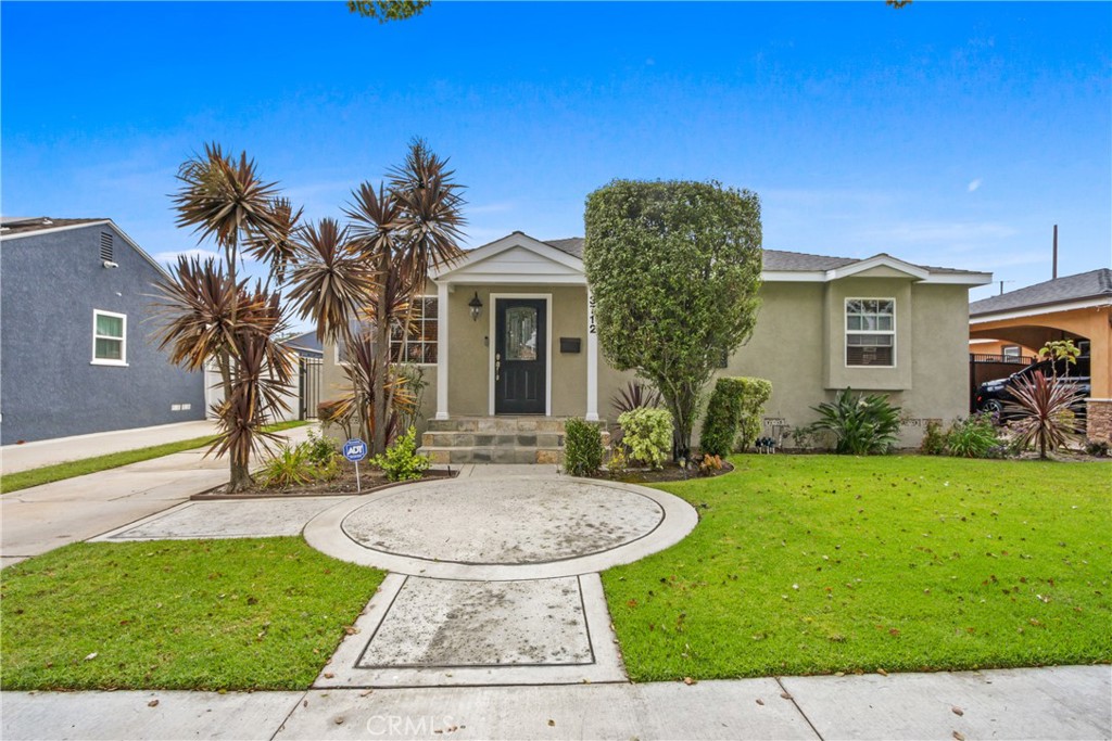Welcome to this sparkling clean, spacious and meticulously maintained family home nestled in the highly desirable Lakewood City neighborhood. The home features granite counters, built-in appliances, dual-pane windows, an upgraded main bathroom, laundry room, fireplace and recessed lighting throughout. It boasts an extra-large primary bedroom and a fully remodeled en suite bathroom with high-end custom finishes. Modern upgrades include a tankless water heater and dual thermostats for zoned climate control. Additional storage has been added to help keep everything organized.
This move-in ready residence offers multiple living areas, providing flexibility for today's lifestyle. The formal dining room is currently being used as a cozy reading or music room-perfect for work or relaxation. Step outside to enjoy the lushly landscaped backyard, complete with two custom pergolas, a built-in gas urn and BBQ, and stone patio...ideal for entertaining or unwinding at the end of the day.
The freshly painted exterior and stone-accented front porch add charm and curb-appeal. A detached two-car garage, long driveway and ample parking make this home as functional as it is beautiful. Conveniently located near the best schools, parks, restaurants and entertainment Long Beach and Lakewood have to offer!