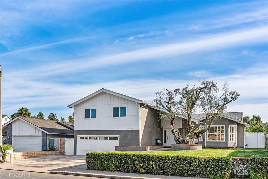 Welcome to this one-of-a-kind professionally custom designed home with top quality finishes, centrally located near schools, shopping, parks and freeways. All new construction on this home was performed by a licensed contractor and fully permitted and inspected by the city of Mission Viejo. With four bedrooms, three full bathrooms and a sparkling pool and spa in over 2400 square feet, this home has it all: new PEX plumbing, completely rewired electrical, new air ducts and insulation, tankless water heater, new plumbing fixtures, Milgard dual pane vinyl windows, luxury vinyl, marble and tile flooring, soft close custom cabinetry and drawers, quartz countertops, appliances and so much more. The kitchen features a large island, a 36-inch, six burner range with a pot filler and opens to the living room. An adjacent dining room with a built-in buffet, beverage refrigerator and large bay windows creates an open floor plan. A separate family room with a bathroom that opens to the outside for pool access, offers flexibility in entertaining. All living spaces open to the backyard with an inviting pool and spa that are completely brand new, including new rebar, plumbing, plaster, tile, pool filter and heater, also completely permitted by the City. Upstairs are four bedrooms including a primary en-suite with huge oversized shower, dual sinks, separate toilet room and walk-in closet. The secondary bathroom has a tub and shower, dual sinks and a separate toilet room as well. The oversized 2-car garage features a new epoxy floor, finished drywall and a 220V electrical outlet for EV hookup installation. All new landscaping and irrigation complete the beautiful ambiance of this top quality custom home. Many recreational opportunities are available through the Mission Viejo Swim and Racquet Club as well as the surrounding community.