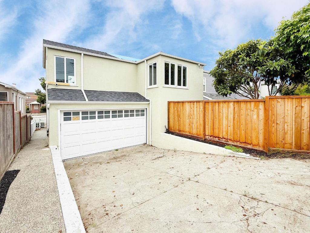 Investor Special! Rare opportunity to own a fully detached two-story home in the highly sought-after Merced Manor/Lakeside neighborhood at a fraction of market value. With fire damage present, this property is perfect for renovation, rebuild, or redevelopment - unlocking tremendous potential with strong resale value and endless possibilities for creative vision. Over $300,000 has already been invested in improvements, including double-paned windows, roof, exterior stucco, electrical, and plumbing. The main level offers 2BD/1BA, formal living room with cove ceilings, and wood-burning fireplace, formal dining room, plus a kitchen that flows seamlessly into breakfast nook and office/family room. A convenient side door entrance adds flexibility, while the lower level can function as a separate living space with a study/bedroom & half bath. The two-car garage provides ample storage with additional driveway parking. Close to Stern Grove, Stonestown Galleria, YMCA, Whole Foods, Trader Joes, Regal Cinemas, The City Sports Club, Lakeshore Plaza, Lakeside Village, West Portal shops, public transit, SFSU, major freeways, and top-rated Lowell High School. Sold as-is - bring your contractor and imagination! Prime location + Huge potential = Unbeatable investment!