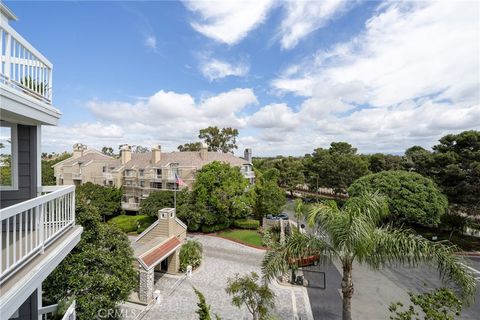 Photo of 20301 Bluffside Circle Cir #315, Huntington Beach, CA 92646 (MLS # PW26064482)