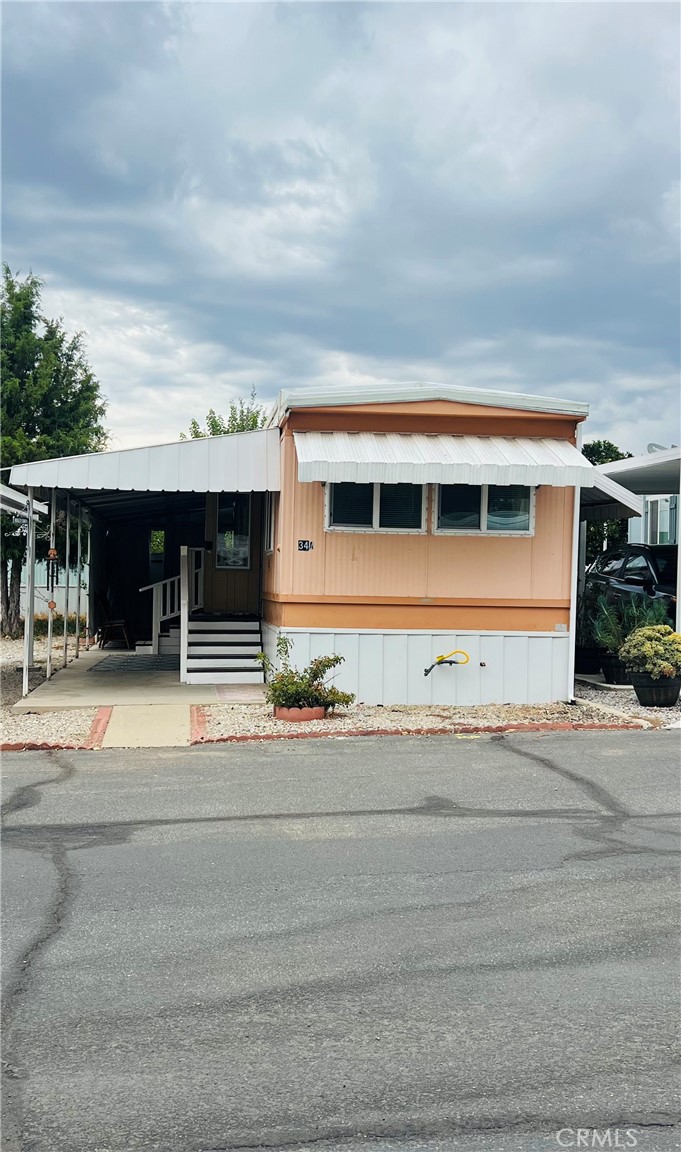 Charming one bedroom mobile home in a welcoming senior community. Discover comfort and convenience in this cozy one bedroom one bathroom mobile home, situated in a peaceful 55+ community. This well maintained home offers inviting quaint living space , a functional kitchen and a bright bedroom designed for easy living. Located in a desirable area close to shopping, dining and healthcare facilities. The community features a friendly neighborhood atmosphere with opportunities for socializing and relaxation. Whether you are looking to downsize, retire, or simply enjoy a low maintenance lifestyle, this home provides the perfect balance of comfort and value