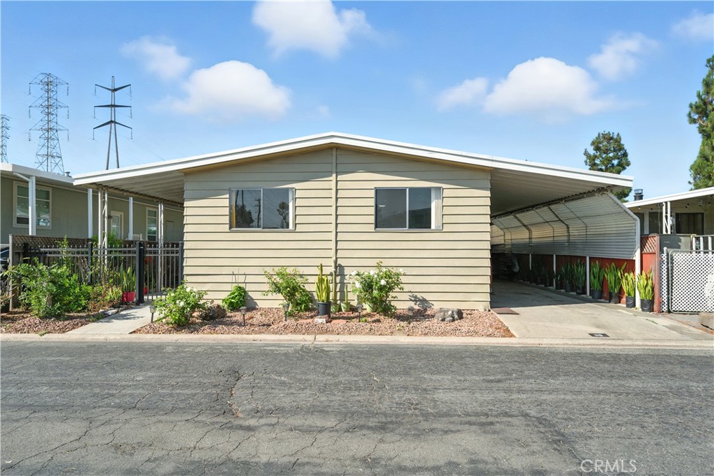 Welcome to 3595 Santa Fe Avenue #60 in Long Beach. This three-bedroom, two-bath home is one of the lowest-priced homes of its size in Long Beach, and you own the land! That alone makes it a standout value.
The owners have already made upgrades, including new flooring in areas and a carport large enough for three vehicles. The home sits on a well-sized lot in a safe, 24/7 guard-gated community that’s known for being well managed. Perfect for kids or anyone who values peace of mind.
The amenities are a major highlight. For a low monthly HOA, you’ll enjoy guarded entry, pool, spa, playground, gym, sports court, billiards room, and more. It’s the ideal setup for entertaining, relaxing, and active living.
Inside, the home is move-in ready with the opportunity to modernize the kitchen and add upgrades for even more upside. With its combination of space, safety, amenities, and long-term potential, this is one of the best values you’ll find in Long Beach right now.
Ask about the High Cost Area Purchase Program which offers up to $8,606 in agency credits for an interest rate buydown.