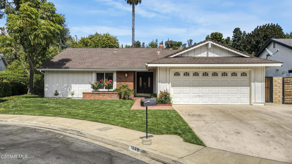 Nestled in the tranquil Oakbrook Highlands neighborhood of Thousand Oaks, this newly refreshed single-story home blends comfort and classic California charm. A spacious open-concept layout welcomes you with waterproof Laminated flooring, fresh interior updates, and an inviting flow ideal for both everyday living and entertaining. The heart of the home features a beautifully positioned dual-sided fireplace that enhances both the generous living room and adjacent dining area. The private primary suite offers peaceful separation, complete with its own en-suite bathroom and ample closet space. Step outside to a serene backyard retreat boasting a raised wood deck, putting green, and covered patio--perfect for relaxing or hosting guests in style. Located on a quiet cul-de-sac with excellent proximity to parks, trails, and schools, this move-in-ready gem offers timeless appeal in one of Thousand Oaks' most desirable communities.