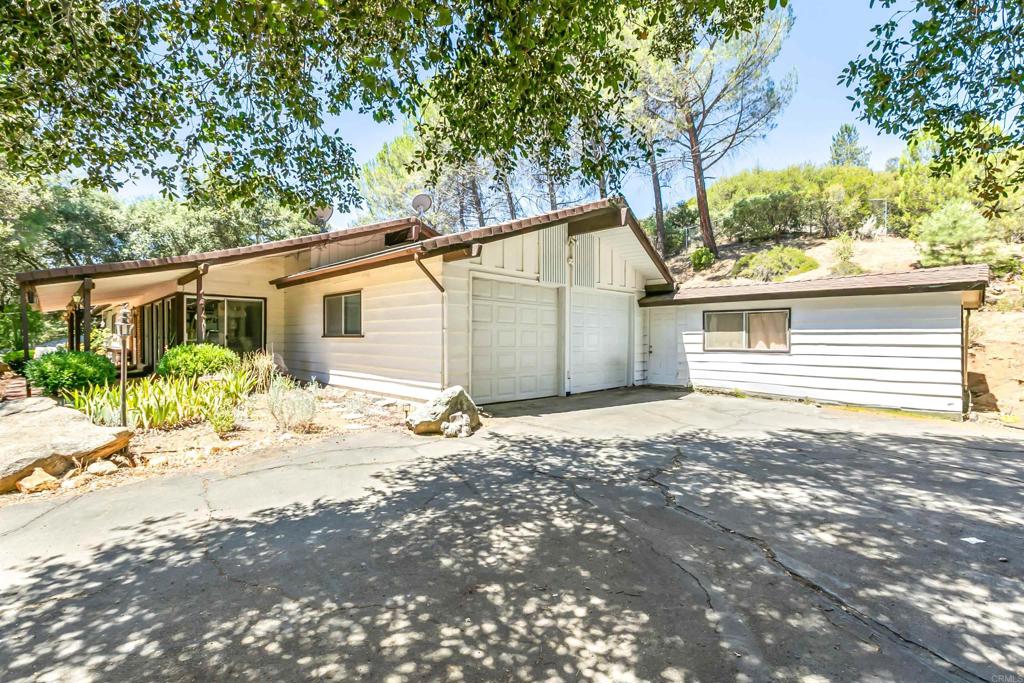 Location! Location! Location! This home is a find of a lifetime! This is Pine Valley at its Best Value! a 2000sf (including the Private bedroom bath off of the Garage) home on a fully fenced 40,000 square foot usable lot is a rare find! The wide doorways and hall make it wheelchair accessible. To build this house on this lot today would surely exceed costs of $800,000 and almost 2 years to process permits! As many of you know shopping for a home to make your own can be grueling, at best, make this home exactly what you want! GREAT BONES, LAYOUT, AND DESIGN waiting for your custom touch! Don't wait come and see what a great deal this property can be! The roof is about 3 yrs old according to friends of the owner..