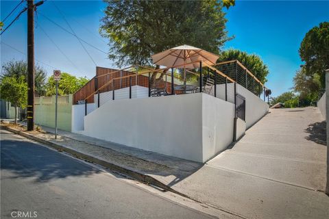 Photo of 6150 Strickland Avenue, Los Angeles, CA 90042 (MLS # DW25274429)