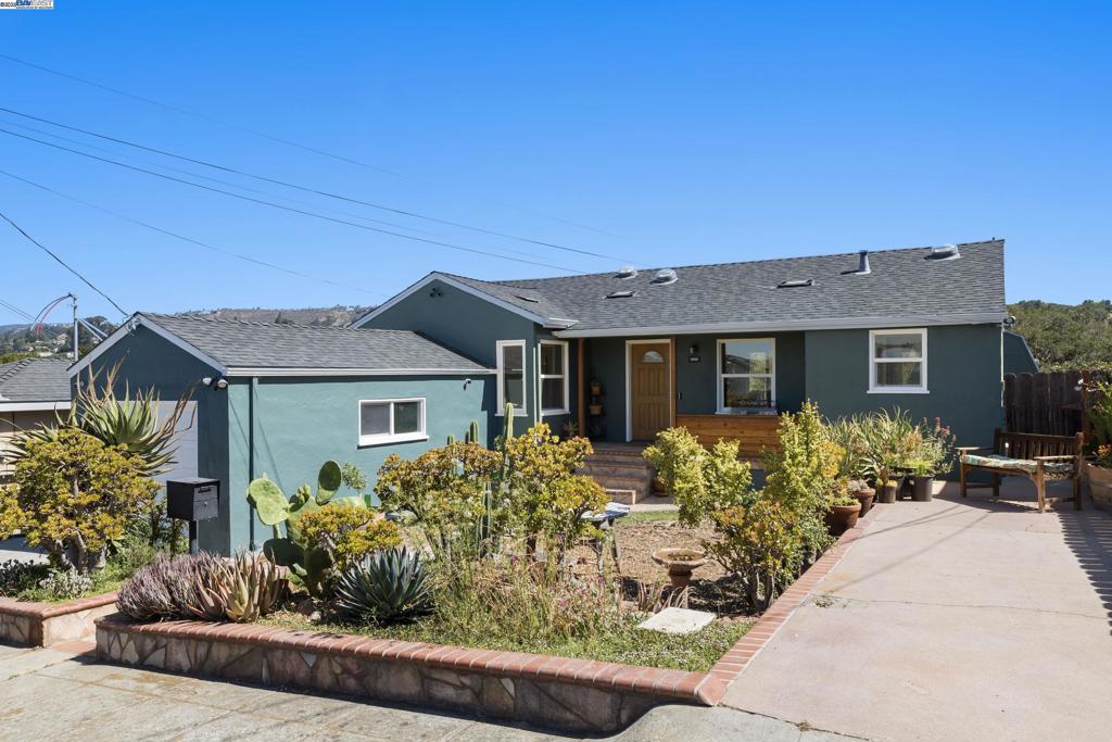 Welcome to your charming urban oasis at 8802 Seneca Street. This thoughtfully renovated 2-bedroom, 2-bathroom home is a rare gem with its blend of character and modern comforts. Inside, you'll find newly refinished hardwood floors, an updated kitchen, and skylights filling the space with natural light. The finished basement with a separate entrance offers the perfect opportunity for a home office, art studio, or gym. Parking is a breeze with the single-car garage and additional driveway, while a large shed in the backyard offers convenient storage. Nestled on a spacious lot with no rear neighbors, this home offers an expansive view into an oak woodland and out to the hills beyond. Imagine waking up to a sunrise over a beautiful oak tree with deer grazing just beyond the fence and then wandering outside to enjoy a peaceful morning coffee in the garden. With a seamless flow between indoor/outdoor living you can dine al fresco with friends and family, or harvest ingredients for your next culinary masterpiece from the raised beds and fruit trees just outside your door. This home is a must-see for gardening enthusiasts who want to feel connected to nature while enjoying the convenience of urban amenities.