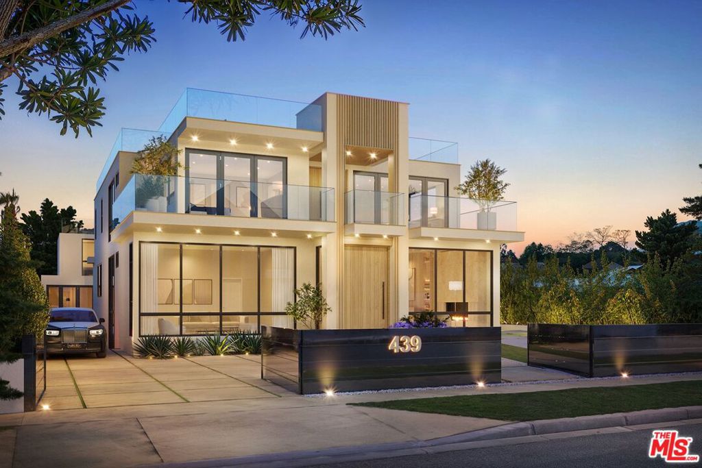 Expected Completion: Fall 2026! Presenting a resort-inspired lifestyle at the prestigious and modern ENCORE, a masterfully designed residence situated in one of the most renowned zip codes in Southern California, 90402, north of Montana Avenue. From this highly coveted 21st Street location, behold striking vistas of the Pacific and discover calming ocean breezes amidst prime shopping and fine dining. This serene sanctuary affords absolute luxury, offering a unique design with an open floor plan and world-class amenities. There are seven bedrooms, seven bathrooms, a powder room, elevator, double-island kitchen fitted with state-of-the-art appliances, two wet bars, four fireplaces, and folding doors that open to invite gentle ocean winds within. Experience a life rich in comfort and leisure with an expansive rooftop deck, standalone 1,000-square-foot two-story ADU, Junior ADU, movie theatre, wine cellar, and meditation room. The rear grounds are an entertainer's dream, including a pool and spa with eight-jet water feature and LED lighting, outdoor fireplace, grassy play areas, and multiple spaces for lounging. The home's elegant form is constructed while keeping openness and clarity top of mind, allowing its light-filled interiors to seamlessly converge with the lush exteriors enveloped by soothing ocean breezes. Four levels comprise a rooftop, upper level, lobby, and basement, with a two-car garage and separate ADU. Welcome to this exquisite property offering the ultimate in resort living at the very forefront of chic, modern design. Renderings are of a similar build.