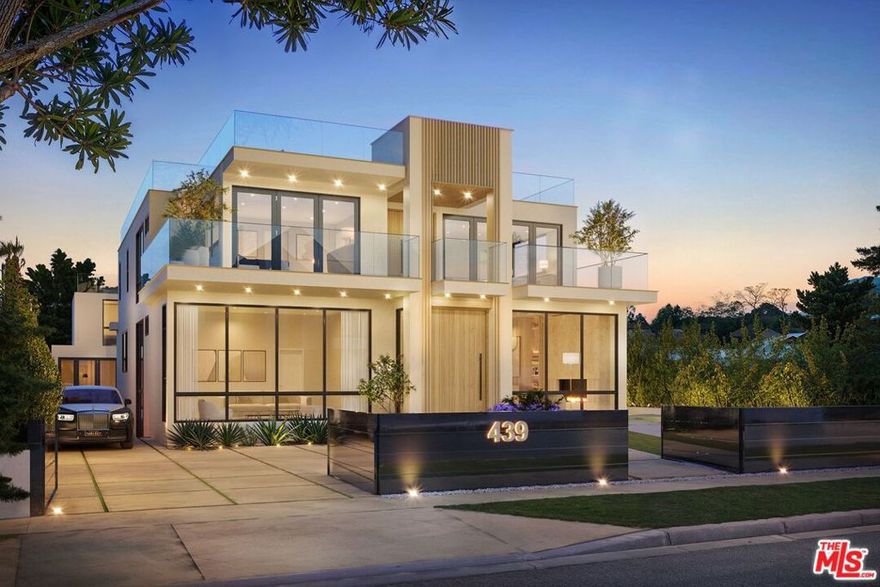 Expected Completion: Fall 2026! Presenting a resort-inspired lifestyle at the prestigious and modern ENCORE, a masterfully designed residence situated in one of the most renowned zip codes in Southern California, 90402, north of Montana Avenue. From this highly coveted 21st Street location, behold striking vistas of the Pacific and discover calming ocean breezes amidst prime shopping and fine dining. This serene sanctuary affords absolute luxury, offering a unique design with an open floor plan and world-class amenities. There are seven bedrooms, seven bathrooms, a powder room, elevator, double-island kitchen fitted with state-of-the-art appliances, two wet bars, four fireplaces, and folding doors that open to invite gentle ocean winds within. Experience a life rich in comfort and leisure with an expansive rooftop deck, standalone 1,000-square-foot two-story ADU, Junior ADU, movie theatre, wine cellar, and meditation room. The rear grounds are an entertainer's dream, including a pool and spa with eight-jet water feature and LED lighting, outdoor fireplace, grassy play areas, and multiple spaces for lounging. The home's elegant form is constructed while keeping openness and clarity top of mind, allowing its light-filled interiors to seamlessly converge with the lush exteriors enveloped by soothing ocean breezes. Four levels comprise a rooftop, upper level, lobby, and basement, with a two-car garage and separate ADU. Welcome to this exquisite property offering the ultimate in resort living at the very forefront of chic, modern design. Renderings are of a similar build.