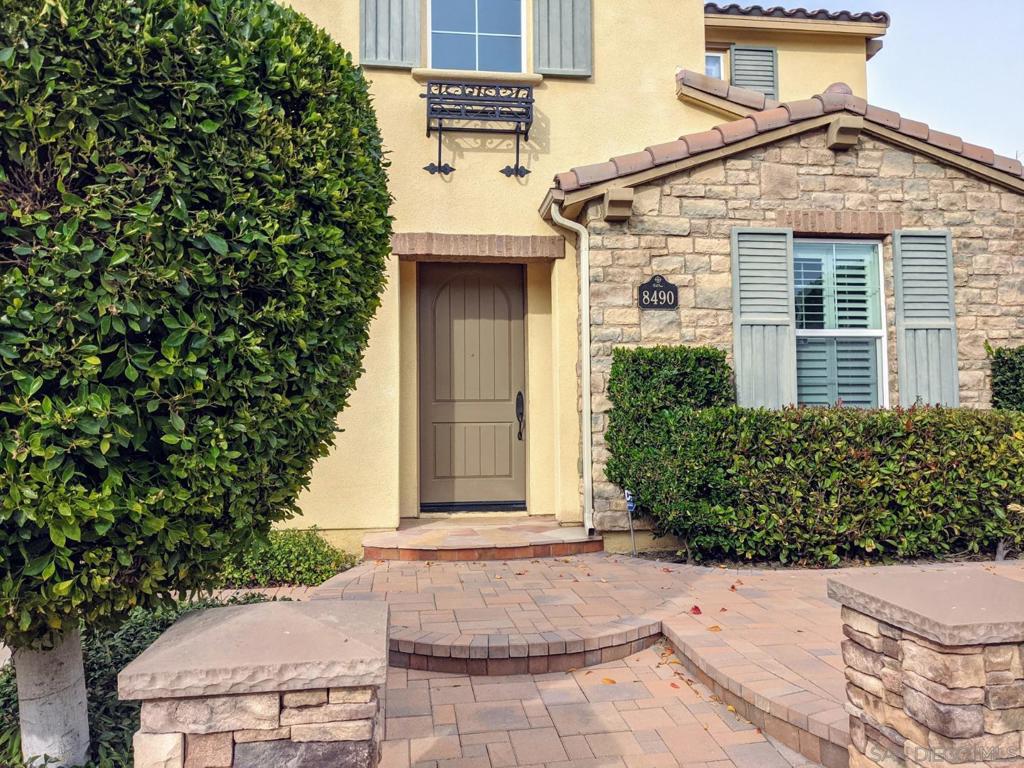 Welcome to the highly desirable Del Sur community in Rancho Bernardo! Beautiful luxury hardwood floors on the first level create a warm and inviting atmosphere. The spacious hallway leads you to the open kitchen and living room area, along with a convenient downstairs bedroom and full bath. The highly upgraded gourmet kitchen features stainless steel built-in side-by-side refrigerator, ample cabinetry, granite countertops, double ovens, and a walk-in pantry. The kitchen opens to a large family room and a California room that flows seamlessly to the cozy, paved backyard with a fire pit — perfect for relaxing or entertaining. Community amenities include multiple pools, spas, parks, clubhouses, and playgrounds. Within walking distance to Del Sur Elementary School, neighborhood parks, restaurants, and shopping. Easy access to I-15 and SR-56 for convenient commuting