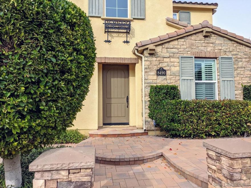 Welcome to the highly desirable Del Sur community in Rancho Bernardo! Beautiful luxury hardwood floors on the first level create a warm and inviting atmosphere. The spacious hallway leads you to the open kitchen and living room area, along with a convenient downstairs bedroom and full bath. The highly upgraded gourmet kitchen features stainless steel built-in side-by-side refrigerator, ample cabinetry, granite countertops, double ovens, and a walk-in pantry. The kitchen opens to a large family room and a California room that flows seamlessly to the cozy, paved backyard with a fire pit — perfect for relaxing or entertaining. Community amenities include multiple pools, spas, parks, clubhouses, and playgrounds. Within walking distance to Del Sur Elementary School, neighborhood parks, restaurants, and shopping. Easy access to I-15 and SR-56 for convenient commuting