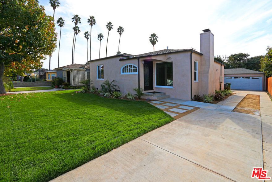 Welcome to this charming 3-bedroom, 2.5-bath single-family home on a generous 6,000 sq ft lot in the heart of West LA. Thoughtfully updated in 2017, this home blends traditional comfort with modern touches and an open, functional layout. Inside, a spacious living room with hardwood floors and a cozy fireplace flows into an oversized kitchen and dining area, perfect for entertaining or relaxed everyday living. The kitchen features stainless steel appliances, granite countertops, wine fridge, and ample cabinet space. Each bedroom offers generous closets and ceiling fans, while the primary suite includes a private ensuite bath. Additional highlights include central air conditioning and a detached two-car garage with an attached bonus suite, complete with its own entrance, kitchenette, and half bath. Ideal for a home office, studio, or guest space. Enjoy California outdoor living on the expansive deck overlooking a private grassy yard, perfect for dining al fresco or unwinding under the string lights. The long driveway offers parking for up to three additional cars. Located on a quiet residential street just half a block from the Metro Expo Sepulveda Station and minutes from Sawtelle Japantown, major freeways, and Westside shopping and dining.