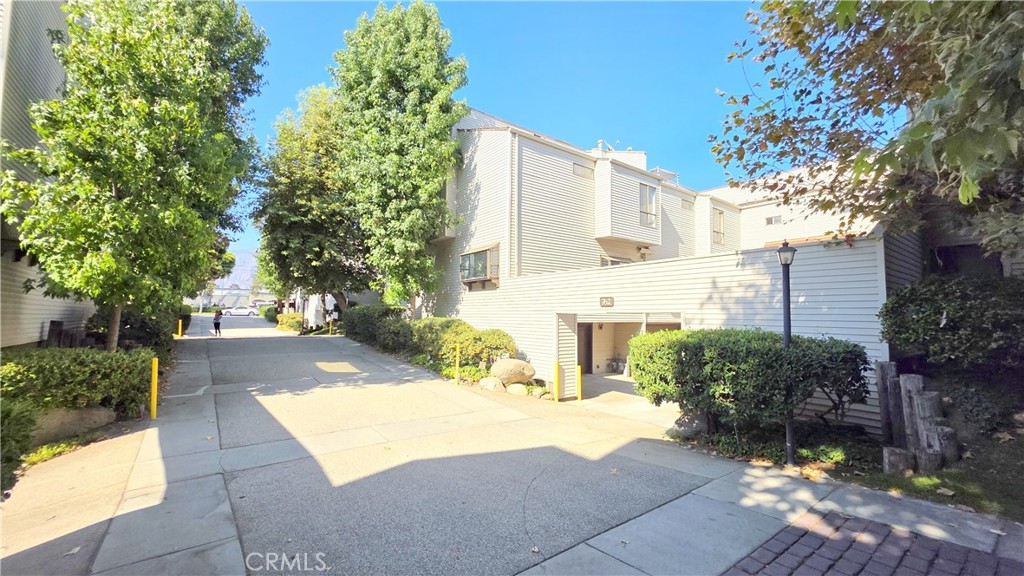 Welcome to this charming 3-bedroom, 2.5-bathroom condo at 800 W Naomi Avenue, Unit D. This home offers an open-concept living and dining area filled with natural light. The kitchen features ample cabinet space, and the generously sized bedrooms provide a peaceful retreat. Enjoy the private patio, perfect for morning coffee. The community offers a sparkling swimming pool and a clubhouse. This residence also includes in-unit laundry hookups and two car attached garage. Located near top-rated Temple city schools, shops, and the 210 freeway, this is an opportunity not to be missed!
