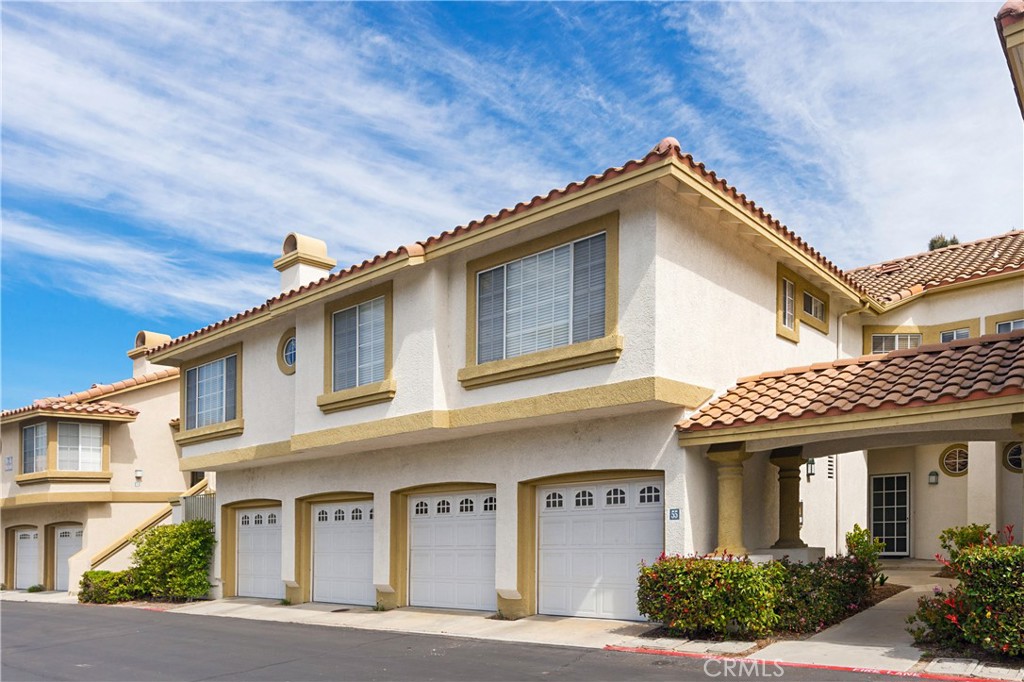 Great townhome in the Casifina neighborhood just steps from Coto de Caza and Santa Margarita High School. Why live in an apartment when you can live in a beautiful townhome with a high walk-ability score due to proximity to Plaza Antonio, El Paseo shops and Central Park. Do you need 2 bedrooms and an area for a home office? This home has spacious dual ensuite primary bedrooms with mountain views (the larger primary bedroom offers enough room for office space) and a kitchen you will love to cook/bake in. The beautiful, light and bright remodeled kitchen with quartz counters and white, shaker style cabinets with soft closing doors and drawers, an eating nook and a breakfast counter are the highlight of this residence. The large living room boasts a dual sided fireplace and easy access to your private patio. In addition to the full bathrooms with dual sinks in each primary bedroom, there's a convenient powder room at the main level. This charming townhome offers a direct access garage (laundry area inside) and an assigned parking spot right in front of the home. Enjoy the RSM lifestyle in the safest city in California!