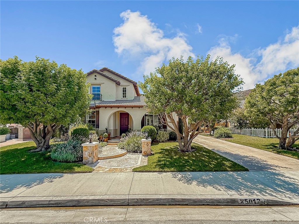 Attention All Stevenson Ranch Buyers & Agents! Wait Till You See Wait Till You See This Rare Offering Of A One Of A Kind Southern Oaks Home Move In Condition With Great Curb Appeal & Courtyard! Fully Owned Solar & 220v Outlet Ready For Electric Car Charger In Your Own Private 3 Car Attached Garage! Former Model Home! Freshly Painted Exterior & Interior! Newly Landscaped Front, Courtyard & Side Yard! Highly Sought After Prime Stevenson Ranch Neighborhood With Exceptional Award Winning Schools Nearby! No Mello Roos! New AC Units! Beautiful Stone Flooring On First Floor! Outstanding Open Floor Plan With Bedroom & Bath Downstairs! Gorgeous Gourmet Granite Center Island Cook’s Kitchen With Large Walk-In Pantry! Lovely Living Room With Custom Beamed Ceiling & Fireplace! Elegant Formal Dining Room Also With Custom Beamed Ceiling! Fabulous Family Room With Its Own Fireplace Too! Marvelous Main Bedroom Suite With Custom Cabinetry & Cedar Lined Closet! Large Loft! Ceiling Fans In The Front Bedroom, Family Room & Loft! Terrific Room Sizes! Fantastic Backyard With Fruit Trees & Raised Garden Beds! Exceptional Neighborhood Amenities Including Clubhouse, Pool & Trails! Great Location! Moments To Everything! If You Are Only Seeing One Sensational Southern Oak Stevenson Ranch Home In The Price Range, Make Sure This Is It! Must See! Do Not Miss! Stevenson Ranch Living At Its Best!