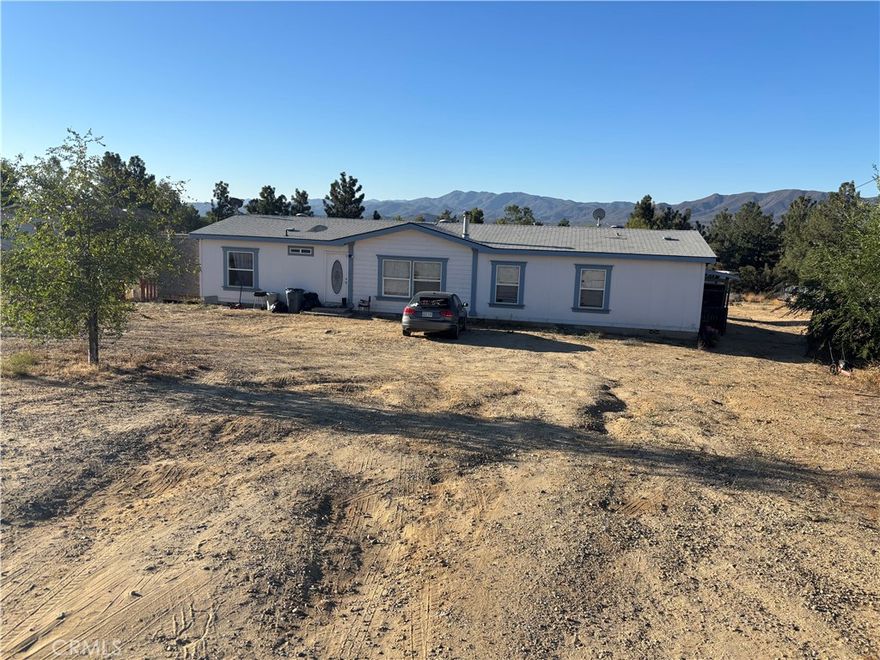 THIS EXCEPTIONAL PROPERTY IS SITUATED IN ANZAC, COUTNY OF RIVERSIDE CA THE SIZE IS 1.35 ACRES THE PROPERTY OFFERS AMPLE SPACE FOR OUTDOOR LIVING, LANDSCAPING, OR FUTURE DEVELOPMENT THE HOME IS METICULOUSLY MAINTAINED AND SPANS 1,782 SQFT 4BED 2BATH THE MANUFACTURE HOME YEAR 2005 IN THEIR OWN LAND LOT HAS A WELL WATER. PLEASE SEE REMARKS AGENTS BRING YOUR BUYERS TO SEE THIS BEAUTIFUL HOME IT HAS SPACE FOR PEOPLE THAT LOVE ANIMALS PLENTY OF LAND. BUYER ANS BUYER AGENT TO DO THEIR OWN DILIGENCE. FIRST SHOWINGS WILL BE 9/27/25