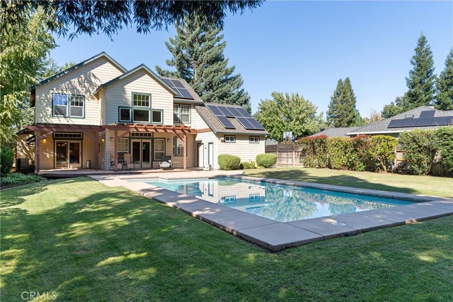 This charming 3-bedroom, 3.5 bath home perfectly blends comfort, convenience, and sustainability. Nestled on a quiet cul-de-sac just steps from Bidwell Park, a local coffee shop, and shopping, this home offers the ideal balance of tranquility and accessibility. Tall redwood trees in the spacious backyard offer plenty of privacy to relax by the pool. This home features a few separate living spaces for all your needs, including a living/family room, a cozy den, and an office. A half bathroom off of the exterior of the home provides convenience for guests while using the pool. Home has beautiful hardwood floors, a spacious kitchen island, soaring living room ceilings, stone fireplace, and owned solar.
Don't miss the rare opportunity to own a beautifully maintained home in this sought after neighborhood!
