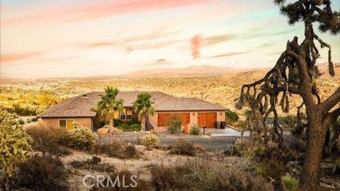 Photo of 7529 Rockaway Avenue, Yucca Valley, CA 92284 (MLS # JT26050463)